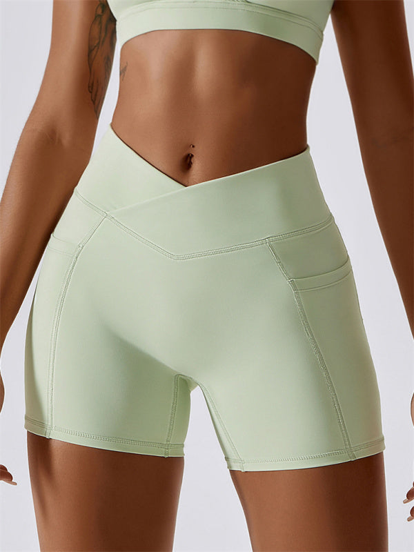 Kairi Women's Naked Hip Pocket Crossover Waist Leggings Sports Shorts